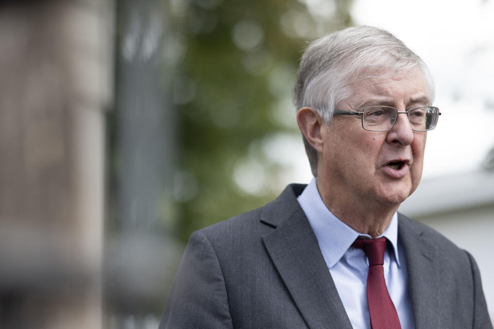 CWMBRAN, WALES - AUGUST 03: First Minister of Wales Mark Drakeford speaks to the press during a visit to Page's fish and chip shop restaurant on August 3, 2020 in Cwmbran, Wales. Coronavirus lockdown measures continue to be eased as the number of excess deaths in Wales falls below the five-year average. From today up to 30 people can meet outdoors and pubs, restaurants and cafes can open to customers indoors. (Photo by Matthew Horwood/Getty Images)