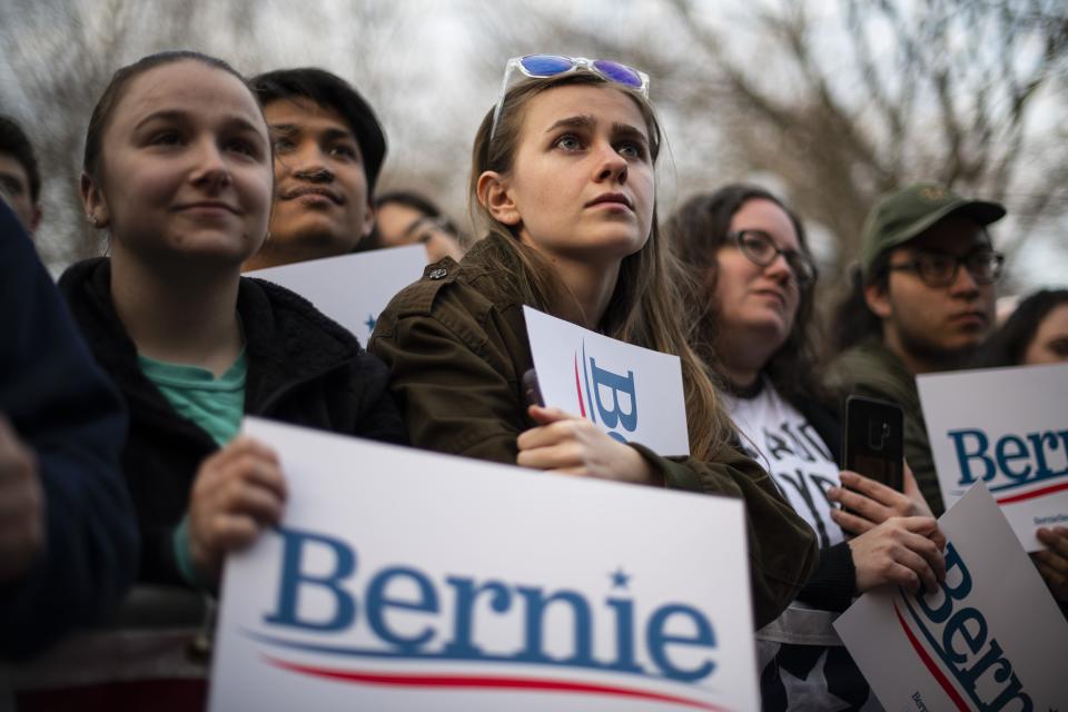 Supporters look on as Rep. Alexandria Ocasio-Cortez (D-NY) speaks during a campaign rally for Democratic presidential candidate Sen. Bernie Sanders on March 8, 2020 in Ann Arbor, Michigan. Cortez has become a Democratic Party favorite among millennials and Gen Z.