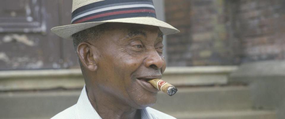 An African-American man smoking a cigar, Vicksburg, MS