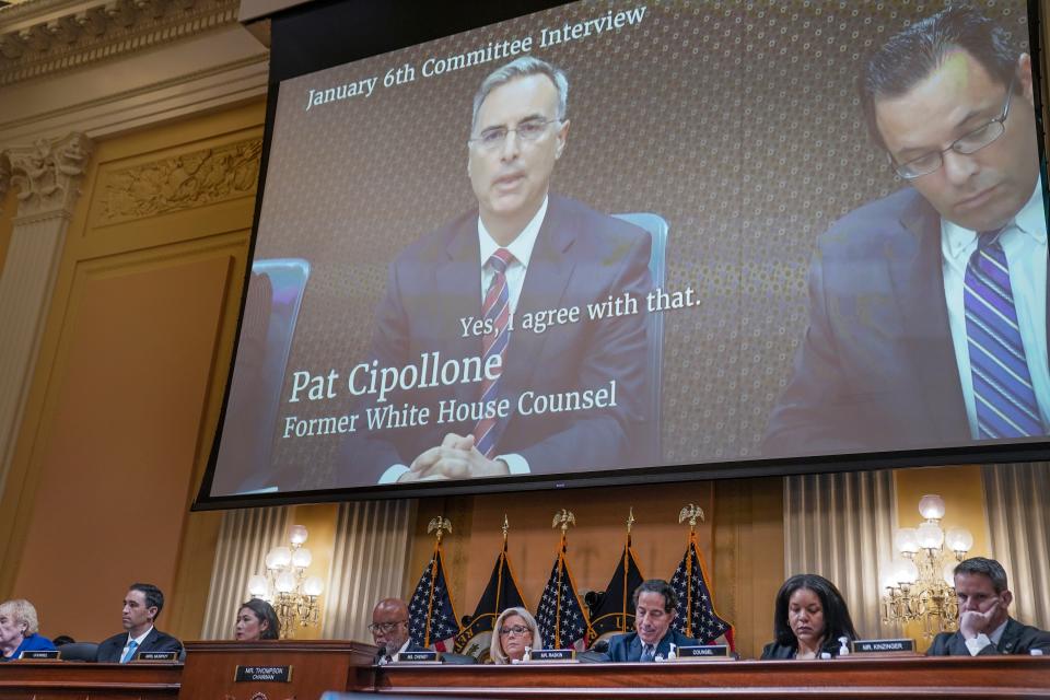 An interview  with Pat Cipollone, former White House counsel is projected on a large screen during a public hearing of the House committee to investigate the January 6 attack on the U.S. Capitol on July 12, 2022.