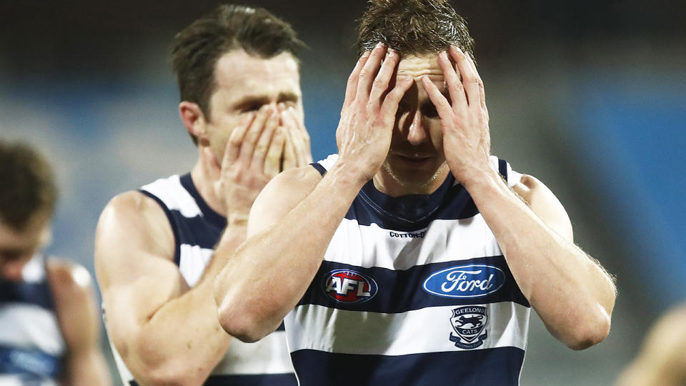 Geelong players, pictured here after their clash with Melbourne Demons.