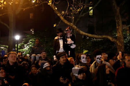 People participate in the New York City Halloween parade in New York City, NY, U.S., October 31, 2017. REUTERS/Shannon Stapleton