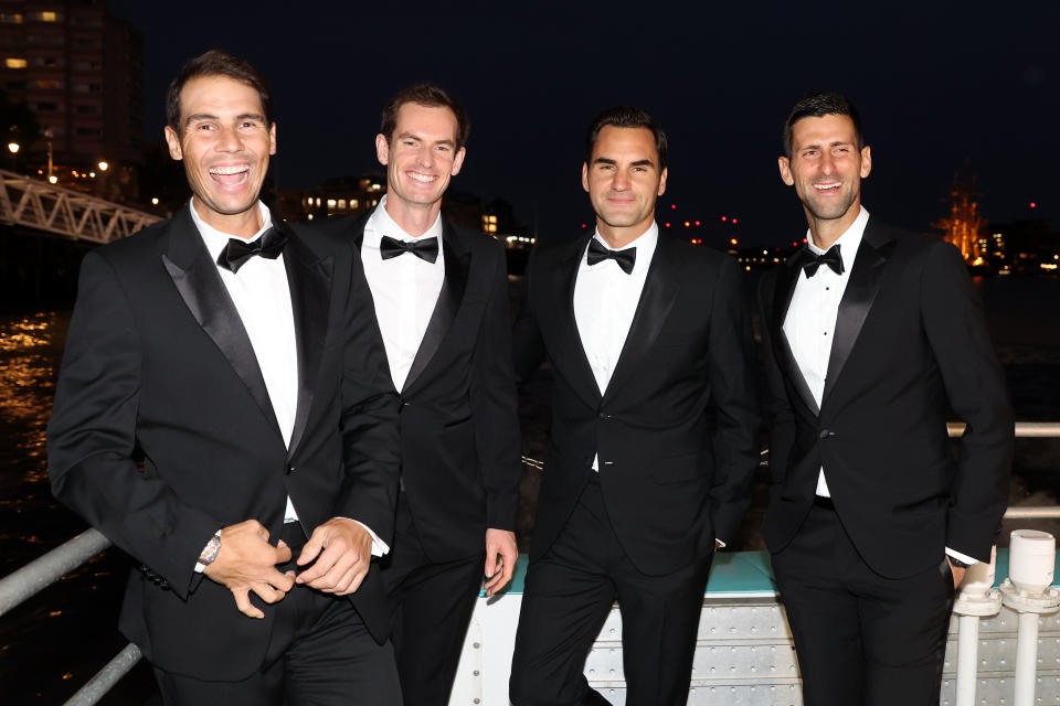 Rafael Nadal, Andy Murray, Roger Federer and Novak Djokovic share a laugh as they pose for a photo.