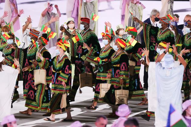 Team Cameroon enters the arena. (Photo: Clive Rose via Getty Images)