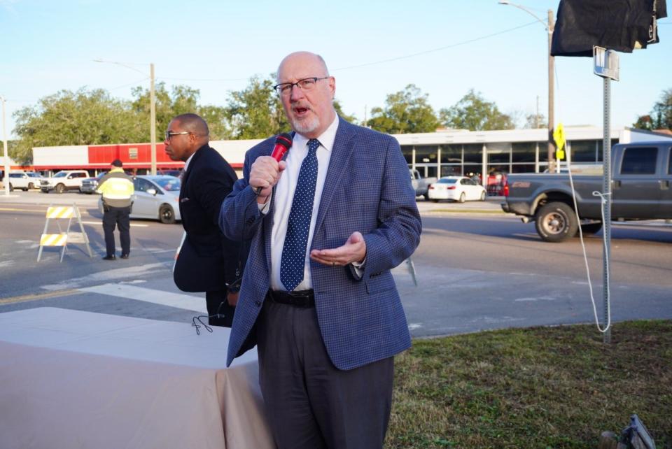 City of Gainesville Mayor Harvey Ward speaks during the unveiling of a street naming ceremony in honor of the late Charles S. Chestnut III on Tuesday morning.
(Credit: Photo by Voleer Thomas, Correspondent)