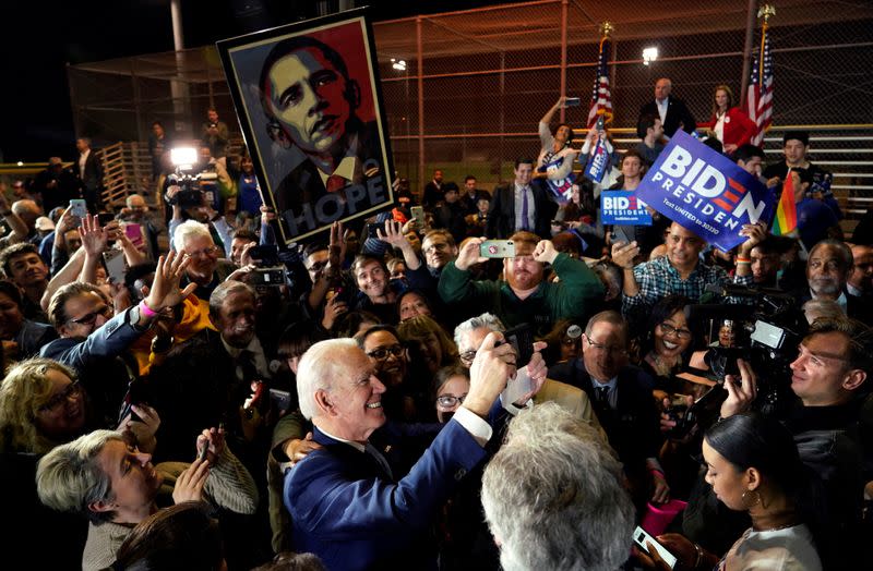 FILE PHOTO: Democratic U.S. presidential candidate and former Vice President Joe Biden with supporters at his Super Tuesday night rally in Los Angeles, California, U.S.