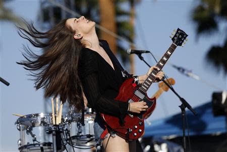 Danielle Haim of rock band Haim performs at the Coachella Music Festival in Indio, California April 11, 2014. A slew of rising artists and bands kicked off the annual Coachella Valley Music and Arts Festival on Friday, ahead of the much anticipated reunion of hip-hop duo Outkast headlining the first night of the three-day festival. REUTERS/Mario Anzuoni