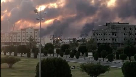 Smoke is seen following a fire at an Aramco factory in Abqaiq