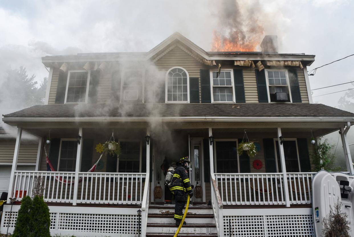 Firefighters at the scene of the Wednesday morning blaze in Fitchburg.