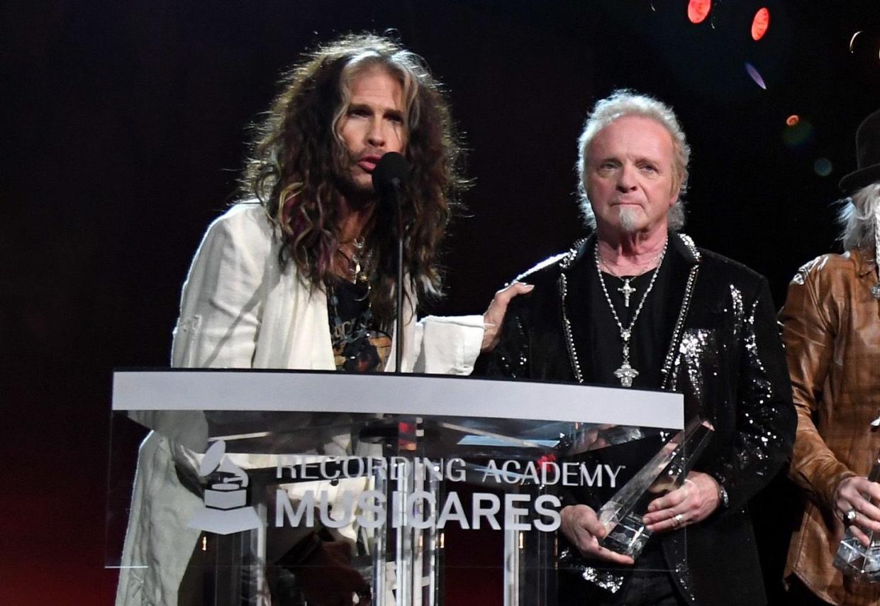 Aerosmith's Steven Tyler and Joey Kramer onstage at the 2020 MusiCares Person of the Year gala. (Photo: Kevin Mazur/Getty Images for The Recording Academy)