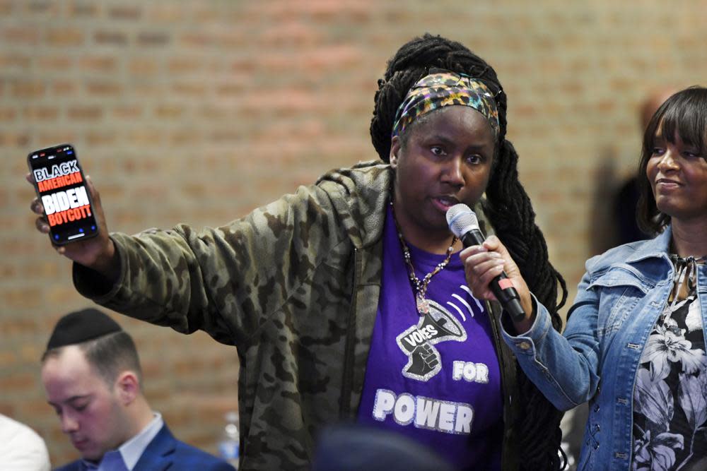 A south side resident speaks to Republican Presidential candidate Vivek Ramaswamy during a town hall meeting Friday, May 19, 2023, in Chicago. (AP Photo/Paul Beaty)