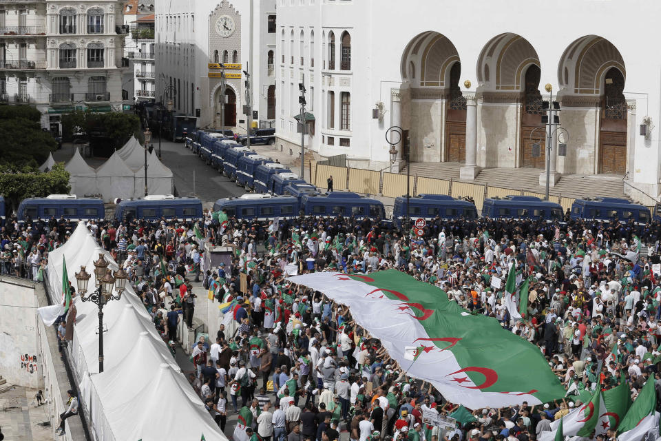 Algerian protesters gather during an anti-government demonstration in the centre of the capital Algiers, Algeria, Friday, June 7, 2019. (AP Photo/Toufik Doudou)