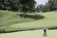 Phil Mickelson putts on the ninth hole during opening round of the Workday Charity Open golf tournament, Thursday, July 9, 2020, in Dublin, Ohio. (AP Photo/Darron Cummings)