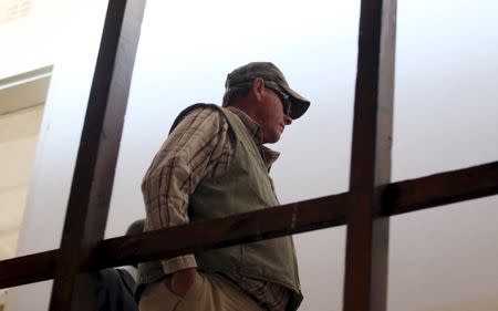 Zimbabwean hunter Theo Bronkhorst arrives at the Hwange magistrates court, August 5, 2015. REUTERS/Philimon Bulawayo