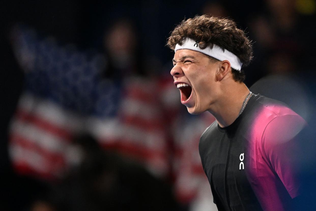 Shelton celebrates his victory in Tokyo. (Kazuhiro Nogi/AFP via Getty Images)