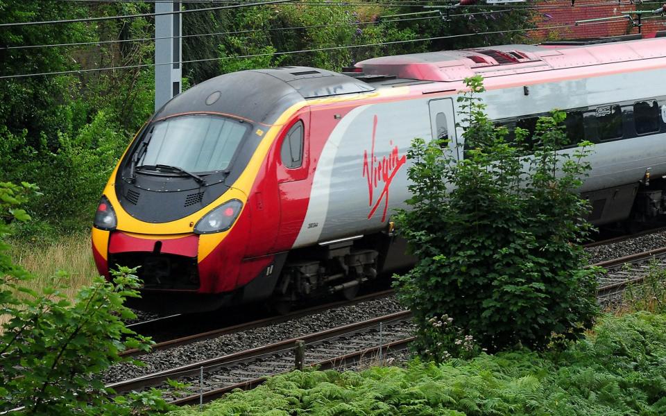 The proportion of people travelling between London and Glasgow by rail rather than air has reached a record level - PA