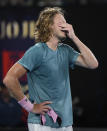 Greece's Stefanos Tsitsipas reacts after defeating Switzerland's Roger Federer in their fourth round match at the Australian Open tennis championships in Melbourne, Australia, Sunday, Jan. 20, 2019. (AP Photo/Andy Brownbill)