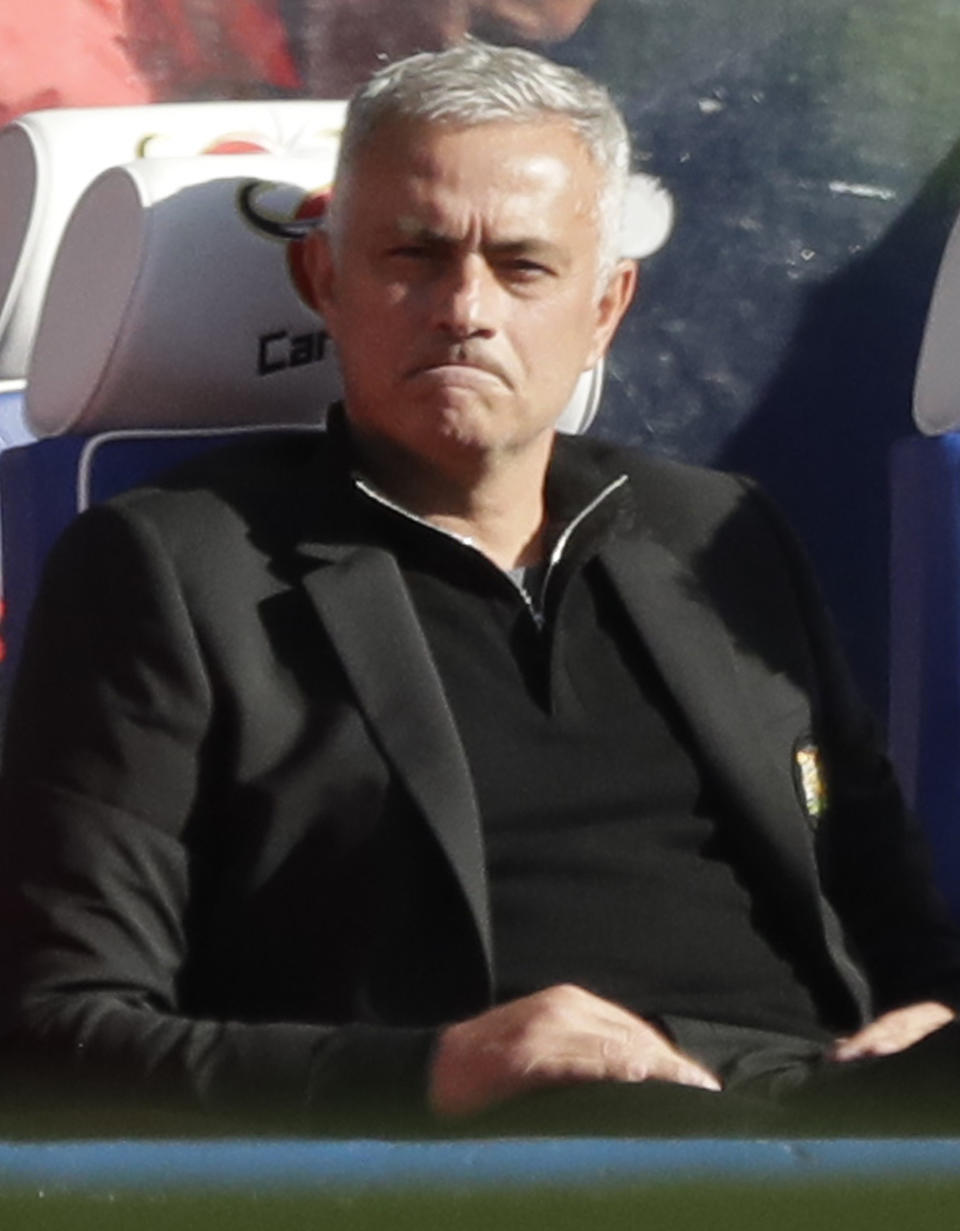 ManU coach Jose Mourinho grimaces during their English Premier League soccer match between Chelsea and Manchester United at Stamford Bridge stadium in London Saturday, Oct. 20, 2018. (AP Photo/Matt Dunham)