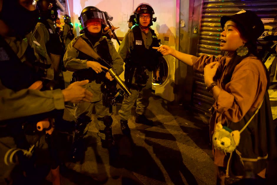 A resident argued with riot police outside the Prince Edward metro station on Nov. 30, 2019.