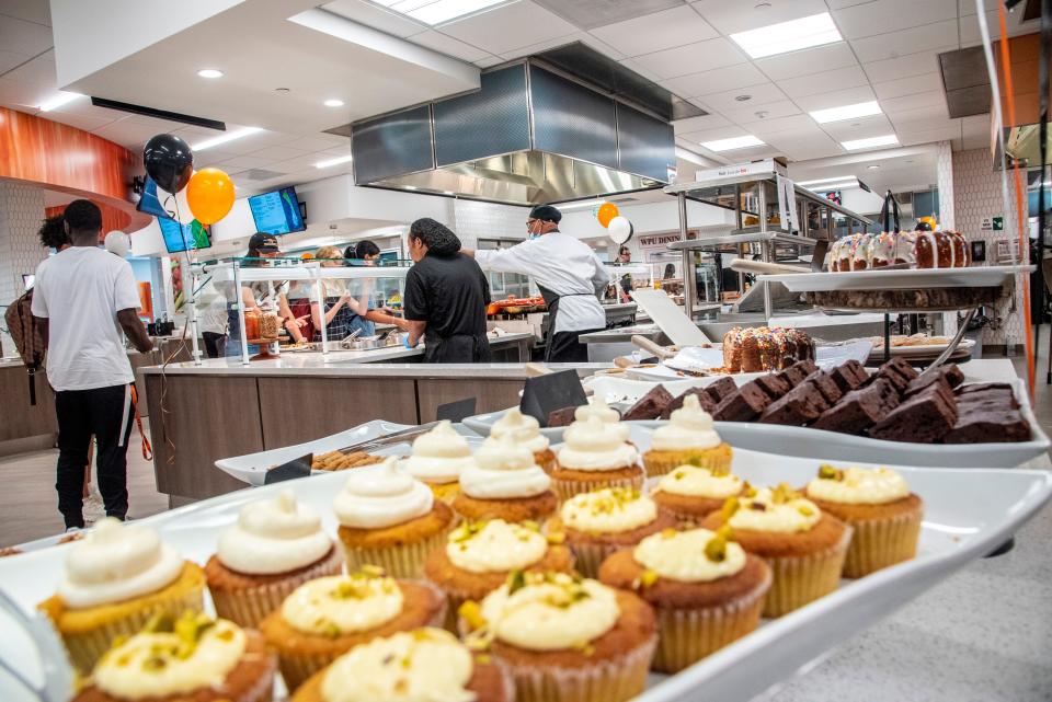 Cupcakes and fudge brownies on display at Proof, a bakery station at the dining hall.