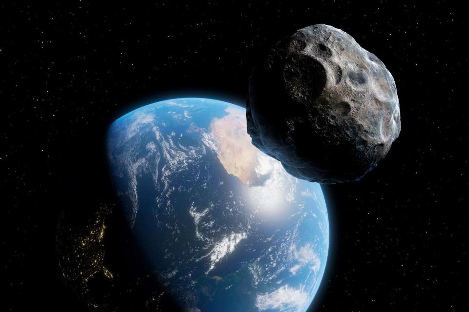 <p>Getty</p> An asteroid approaches the Earth