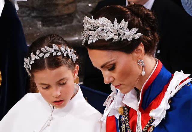 <p>Yui Mok//Getty</p> Princess Charlotte (left) and Kate Middleton at the coronation of King Charles on May 6, 2023