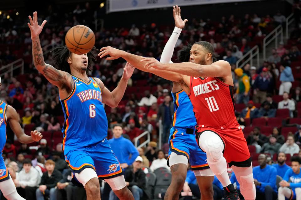 Houston Rockets guard Eric Gordon (10) passes as Oklahoma City Thunder forward Jaylin Williams (6) defends during the second half of an NBA basketball game on  Feb. 1, 2023, in Houston.