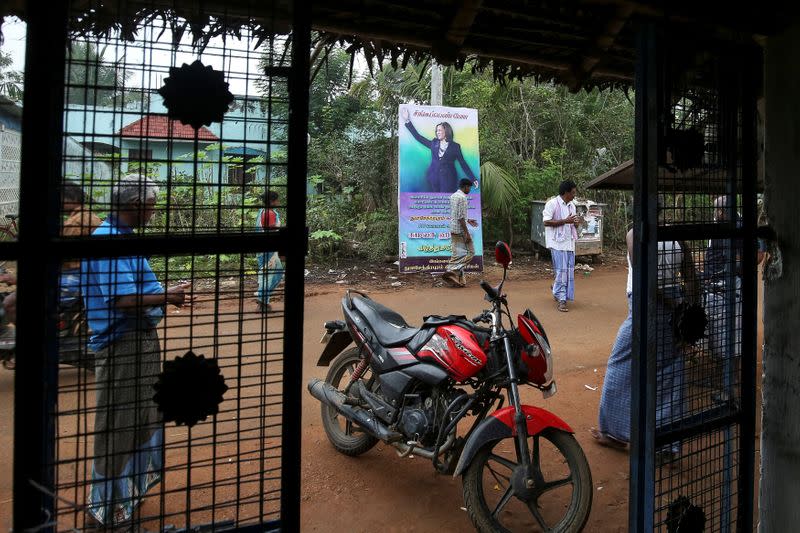 A hoarding with the photo of Vice President-elect Kamala Harris is seen in the village of Thulasendrapuram