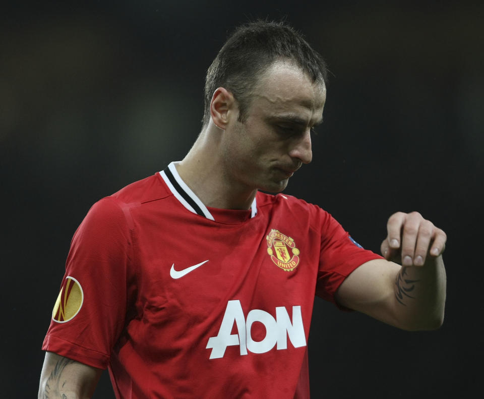 MANCHESTER, ENGLAND - FEBRUARY 23:  Dimitar Berbatov of Manchester United shows his disappointment at being substituted during the UEFA Europa League round of 32 second leg match at Old Trafford on February 23, 2012 in Manchester, England.  (Photo by John Peters/Manchester United via Getty Images)