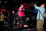 Members of the media try out a Le Super Bike during a press event in San Francisco, California, U.S. October 19, 2016. RETUERS/Beck Diefenbach