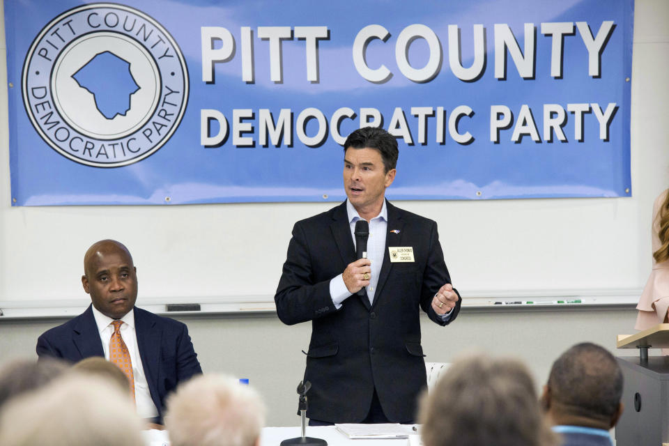 This April 15, 2019, file photo shows Allen Thomas speaking during a forum held by the Pitt County Democratic Party for the Third Congressional District candidates in Winterville, N.C. Voters on Tuesday decide the successor to the late Rep. Walter Jones Jr. in the 3rd Congressional District. But residents were likely thinking more about weather than elections Thursday, Sept. 5, 2019 as Dorian approached with high winds and heavy rains. Early in-person voting in the district has been cut short due to the storm. (Juliette Cooke/The Daily Reflector via AP, File)