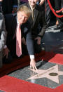 <p>Trump is honored with a star on the Hollywood Walk of Fame on Jan. 16, 2007. <i>(Photo: M. Tran/FilmMagic)</i> </p>