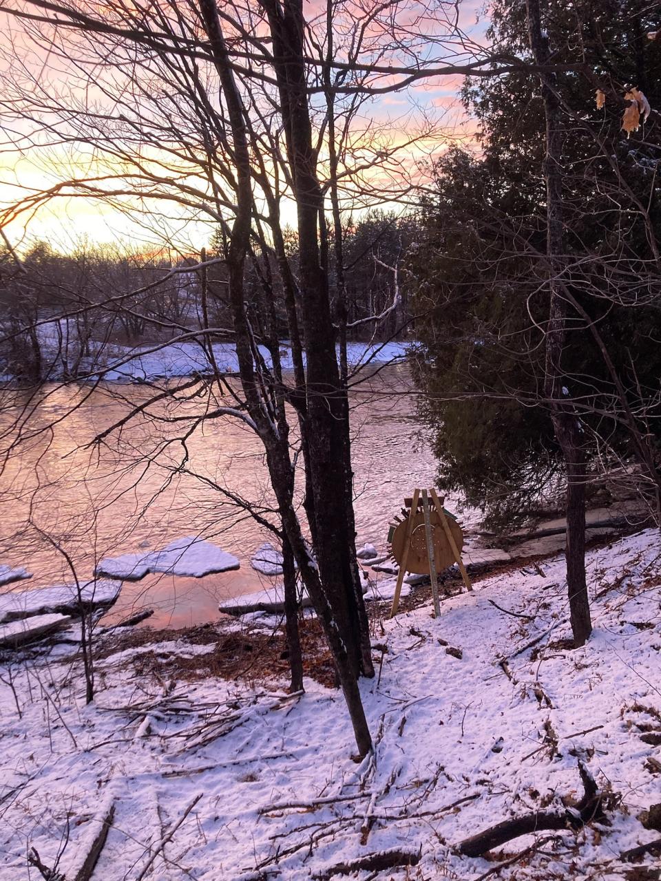 One of Henry Dean's sculptures for his 'Now and then' installation sits on the bank of the Meduxnekeag Rover, on the reservation of the Houlton Band of the Maliseet Indians.