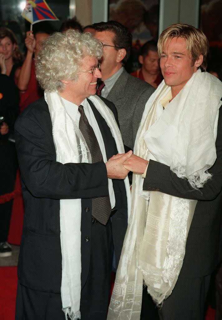 <p>Brad and director Jean-Jacques Annaud pose at the premiere of <em>Seven Years in Tibet</em>. The film's portrayal of the Chinese government resulted in Jean-Jacques and Brad being banned from China after its release, but the <a href="https://www.thestar.com/news/world/2016/11/14/brad-pitt-back-in-china-nearly-20-years-after-reported-ban-over-tibet-film.html" rel="nofollow noopener" target="_blank" data-ylk="slk:Associated Press;elm:context_link;itc:0;sec:content-canvas" class="link "><em>Associated Press</em></a> reports that Brad returned in 2014 with then-wife Angelina Jolie.</p>