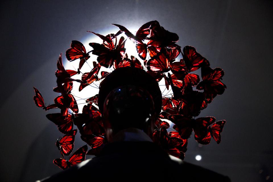 The Philip Treacy Butterfly Hat is displayed at the press view of the "Isabella Blow: Fashion Galore!" exhibition in London, Tuesday, Nov. 19, 2013. The exhibition, which runs from November 20 to March 2, celebrates the life and wardrobe of the late British patron of fashion and art who discovered many young fashion design talents. (AP Photo/Matt Dunham)