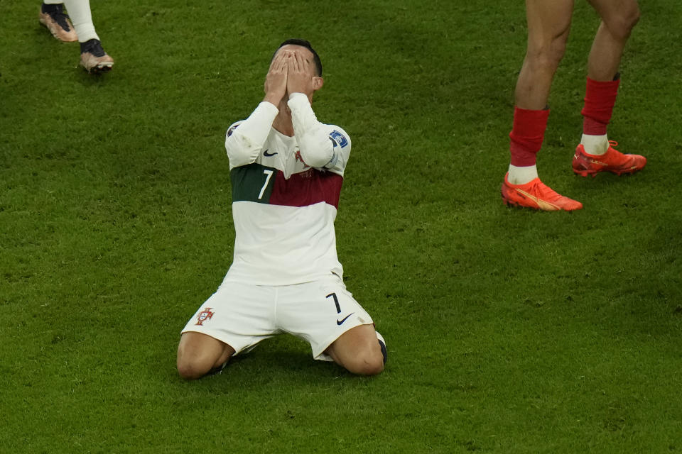 Portugal's Cristiano Ronaldo reacts after teammate Pepe missed a chance to score during the World Cup quarterfinal soccer match between Morocco and Portugal, at Al Thumama Stadium in Doha, Qatar, Saturday, Dec. 10, 2022. (AP Photo/Alessandra Tarantino)