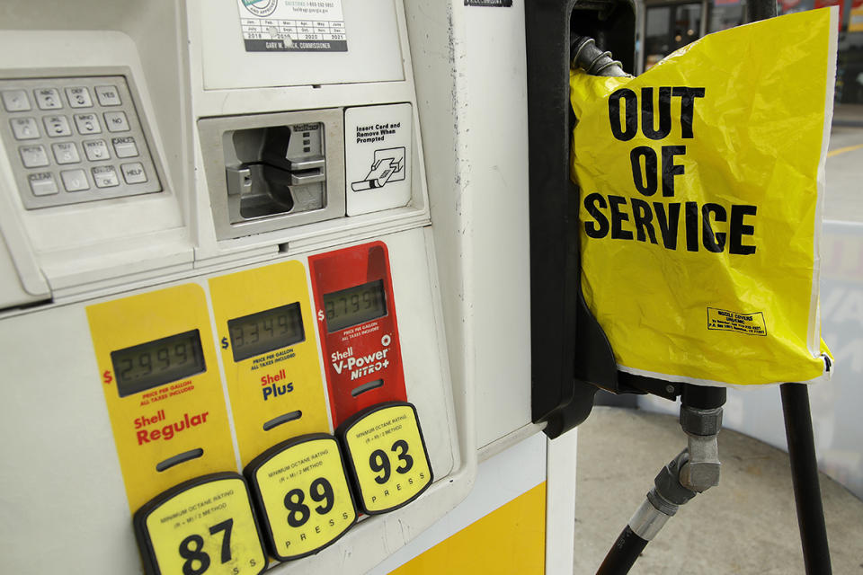 A gasoline station that ran out of gas for sale displays an out of service sign on the pump on Tuesday, May 11, 2021, in Atlanta. (AP Photo/Ben Margot)