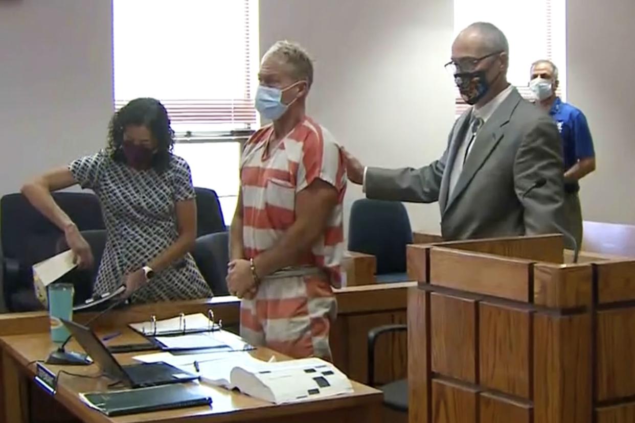 In this Thursday, May 6, 2021, file mage from video, Barry Morphew, center, appears in court in Salida, Colo. According to a court document released Monday, Sept. 20 investigators allege that Morphew, charged with killing his missing wife, decided to "hunt and control" her like an animal after she insisted on leaving him and later changed his statements as evidence in the case developed.