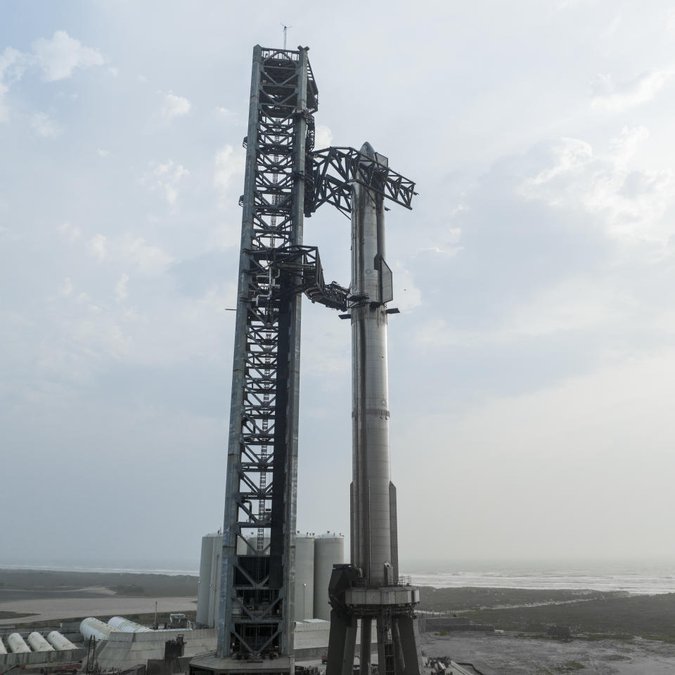 SpaceX's Starship vehicle sits fully stacked at the company's Starbase facility in South Texas in April 2023, ahead of a planned orbital test flight attempt.