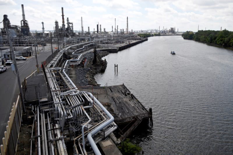 FILE PHOTO: A boat passes beside the Philadelphia Energy Solutions plant refinery in Philadelphia