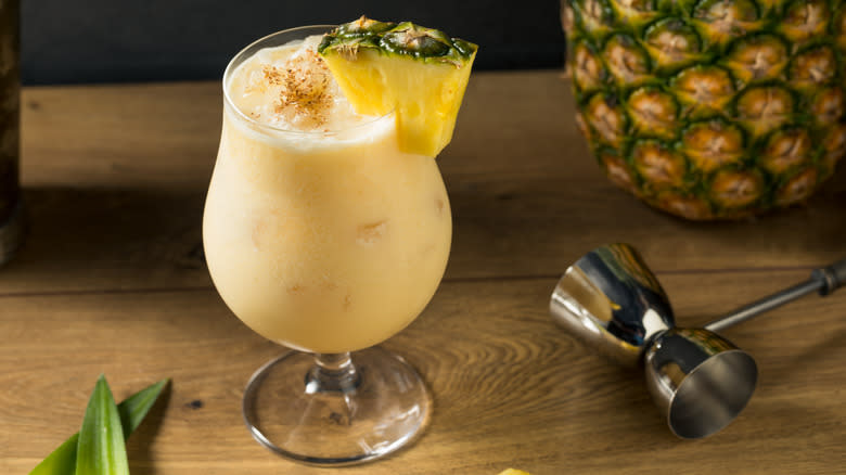 tiki cocktail garnished with pineapple