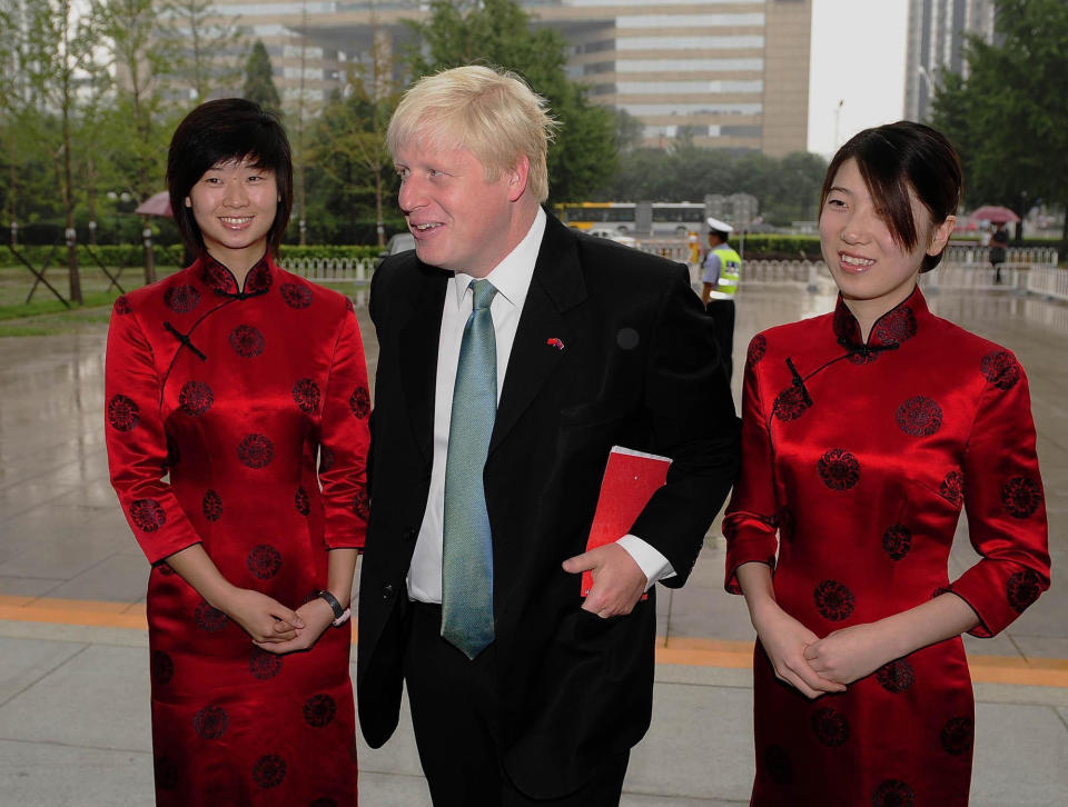 RETRANSMISSION: CAPTION CORRECTION: making clear he is arriving for meeting. Mayor of London Boris Johnson arrives at the Beijing International Hotel Conference Centre to meet the Mayor of Beijing Guo Jiniong ahead of the London Handover at the Closing Ceremony on Sunday of the 2008 Olympic Games in China.