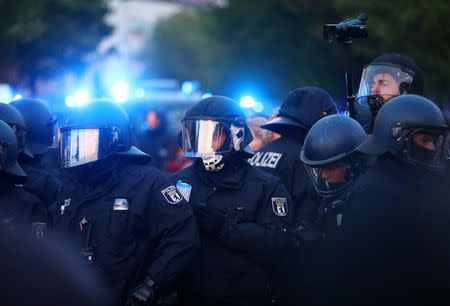 Police stand in formation during a left wing May Day demonstration in Berlin, Germany, May 1, 2019. REUTERS/Hannibal Hanschke