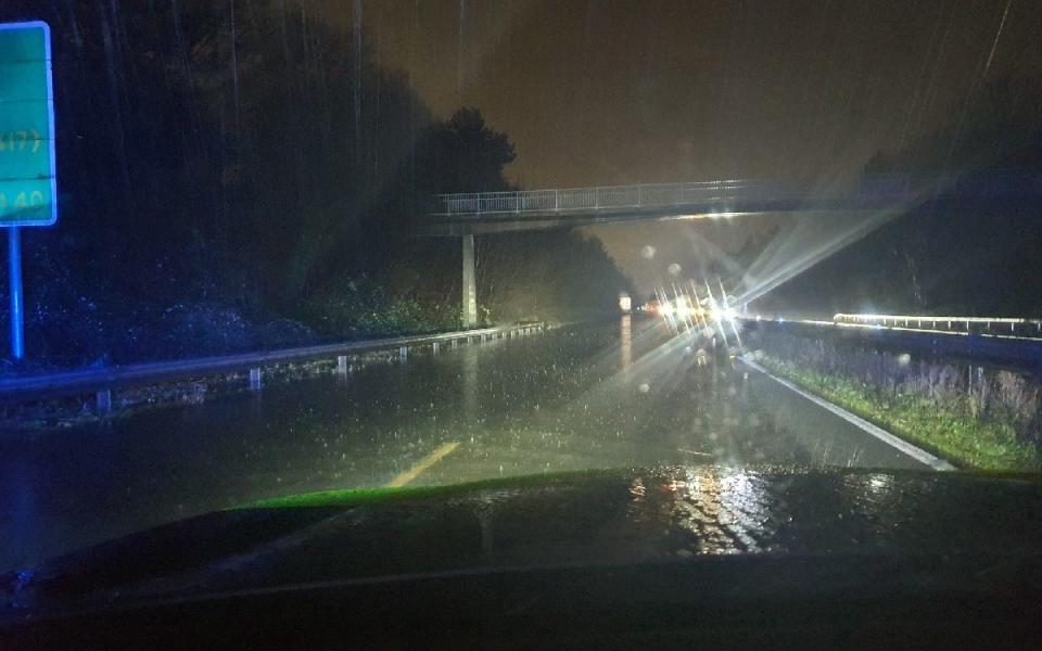 The A40 Golden Valley bypass between Cheltenham and Gloucester west-bound which was closed due to flooding - PA