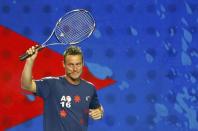 Australia's Lleyton Hewitt waves during Kids Tennis Day at Melbourne Park, Australia, January 16, 2016. REUTERS/Thomas Peter