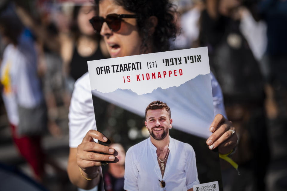Relatives and friends of people kidnapped during the Oct. 7 Hamas attack in Israel, demonstrate during a protest calling for the return of the hostages, in Tel Aviv, Israel, Friday, Nov. 3, 2023. (AP Photo/Bernat Armangue)