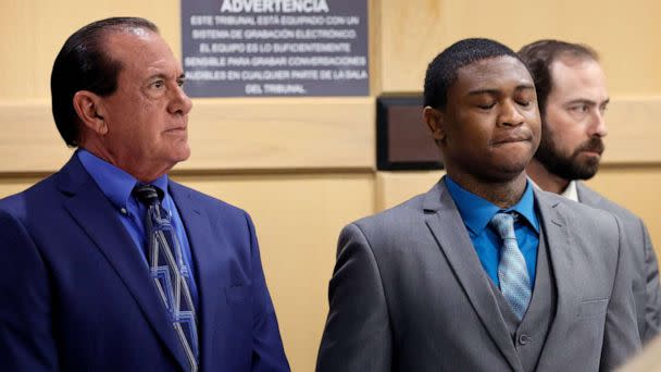 PHOTO: Suspected shooting accomplice Trayvon Newsome, right, inhales deeply as he stands for the jury to enter the courtroom for closing arguments in the XXXTentacion murder trial at the Broward County Courthouse in Fort Lauderdale, Fla., March 7, 2023. (South Florida Sun-Sentinel/Pool via AP)