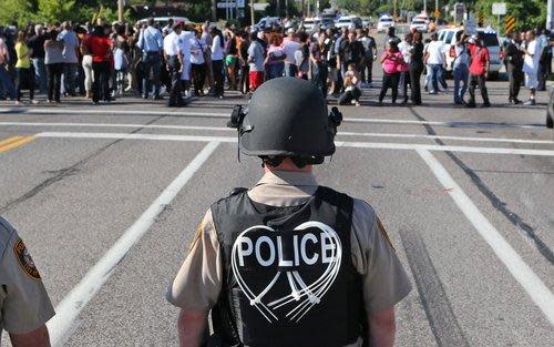 Police and protesters in Ferguson