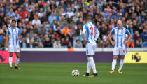 <p>Huddersfield Town’s Aaron Mooy and team mates look dejected after Tottenham’s Harry Kane scored their first goal (REUTERS/Peter Powell) </p>