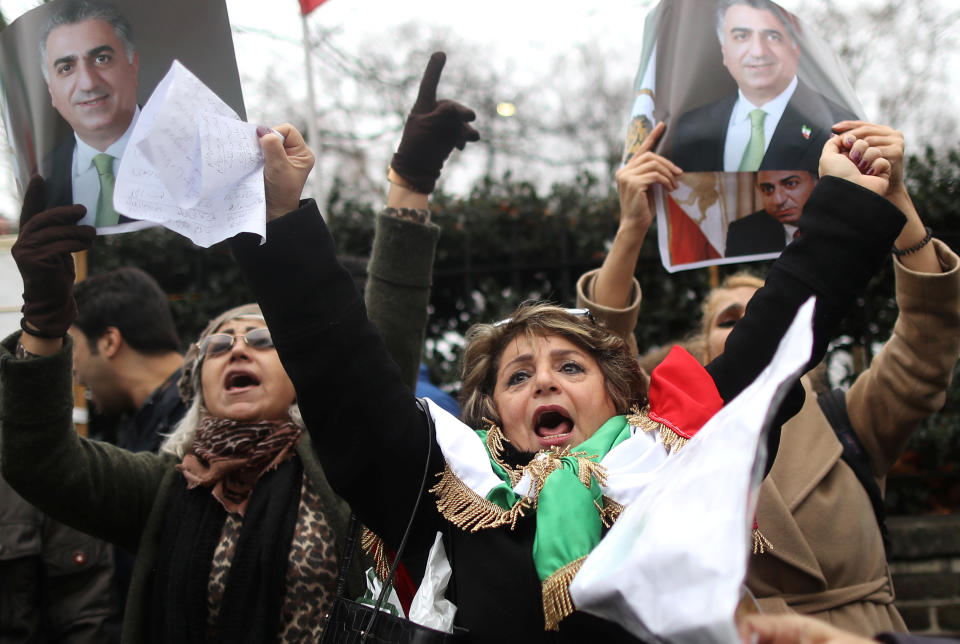 <p>Opponents of Iranian President Hassan Rouhani hold a protest outside the Iranian embassy in west London, Britain, Jan. 2, 2018. (Photo: Simon Dawson/Reuters) </p>